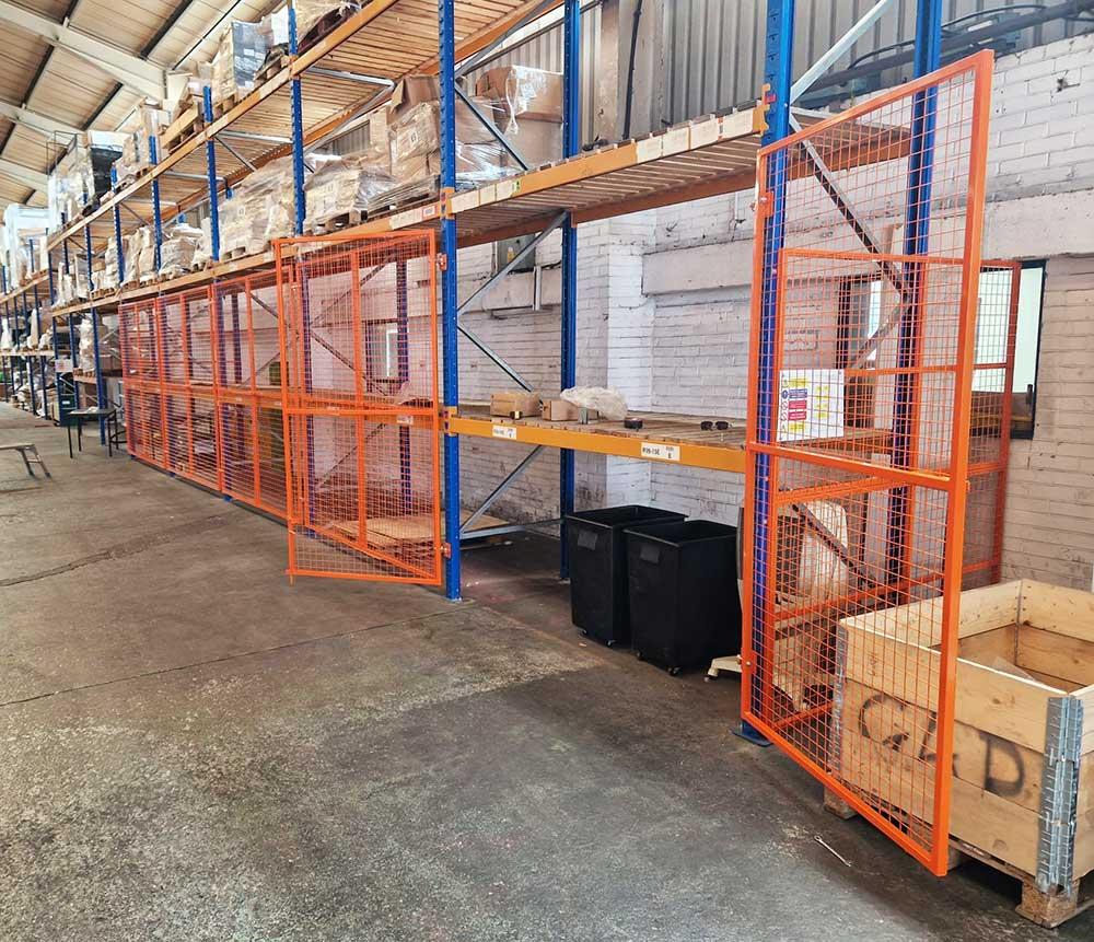Pallet racking fitted with mesh doors to bays