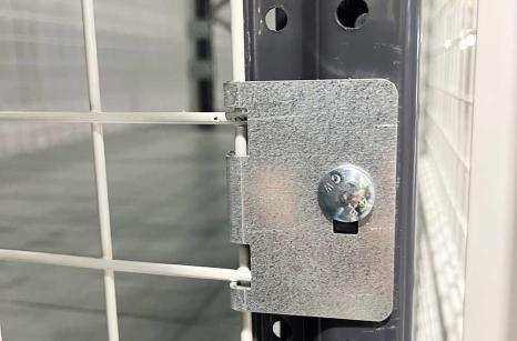 Bracket to secure mesh to shelving